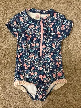 RuffleButts Girls Moonlit Meadow Short Sleeve One Piece Rash Guard